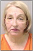 Widow charged in 2006 murder