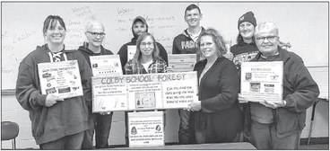 Colby FFA Alumni help out with school forest signs