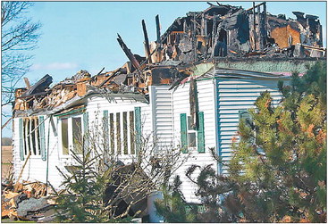 Fire destroys home in town of Holton