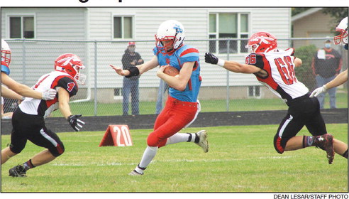 First 8-man game a learning experience for Greenwood First 8-man game a learning experience for Greenwood
