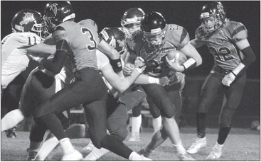 Falcons topple Wolverines for first win