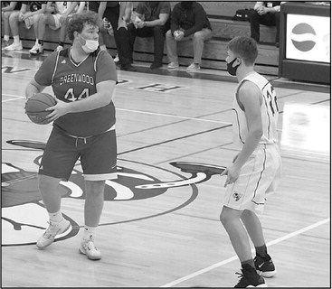 Halfcourt heave sparks Greenwood boys to 17-point win at Colby