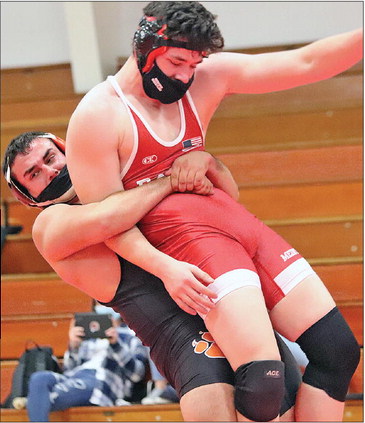 Coach wins first dual Coach wins first dual