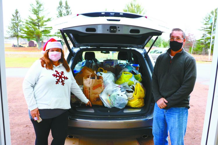 Couple with Holcombe ties fills Jeep for food pantry Couple with Holcombe ties fills Jeep for food pantry