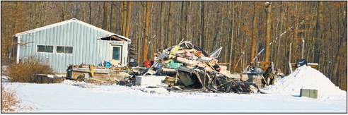 Fire crews battle house fire and brutal cold