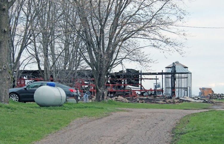 Garbage burn blamed for machine shed fire Garbage burn blamed for machine shed fire