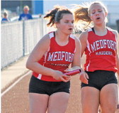 Medford’s Alyssa Brandner gets out …. Medford’s Alyssa Brandner gets out ….