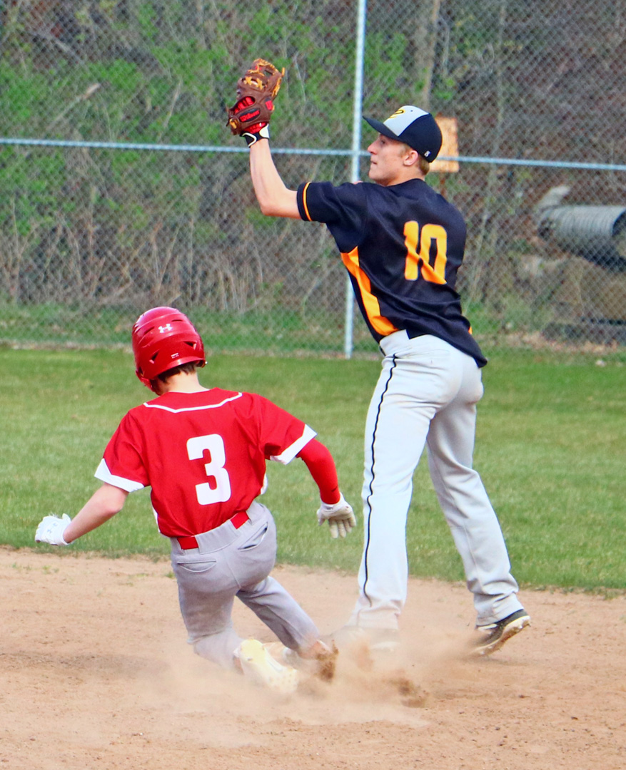 Hornets split non-conference season openers