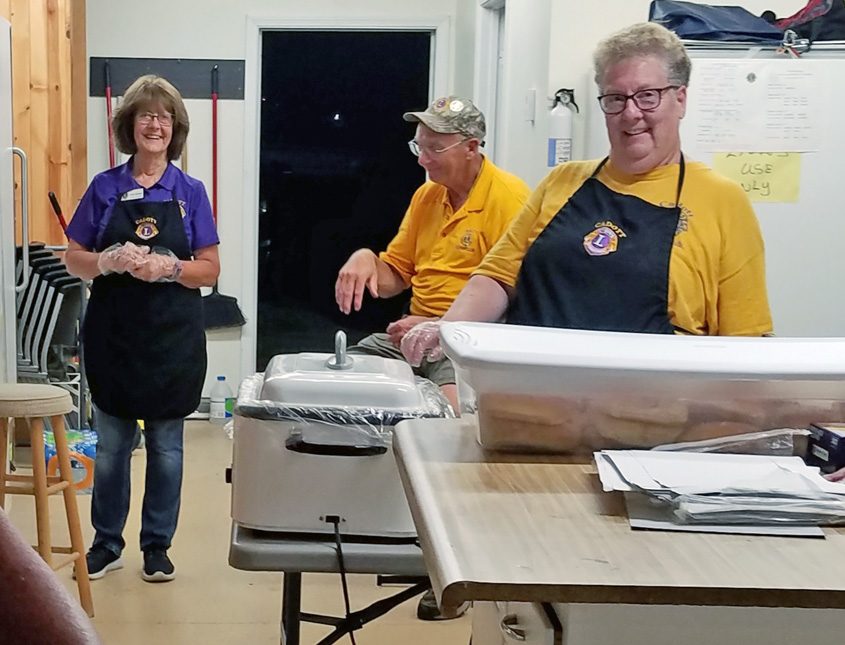 Hot days make hot work for Cadott Lions Club members
