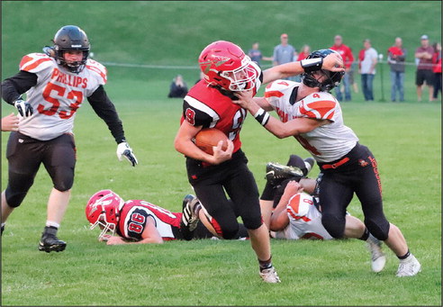 Greenwood holds off Phillips’ last-minute rally for 24-20 win