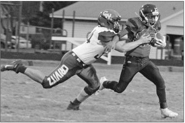 Abby overcomes fumbles, Wolverines Abby overcomes fumbles, Wolverines