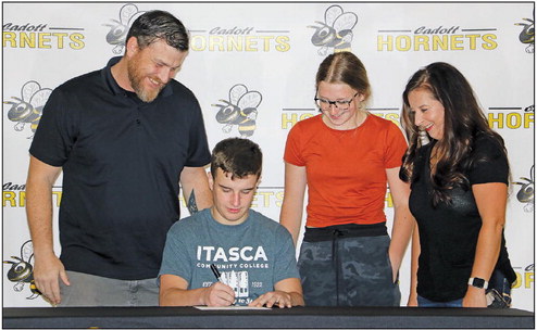 Harel ensures a quality education while wrestling Harel ensures a quality education while wrestling