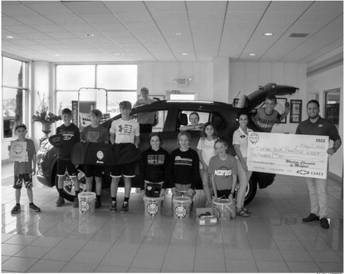 Wheelers Chevrolet in Medford presents donation to Medford Little League