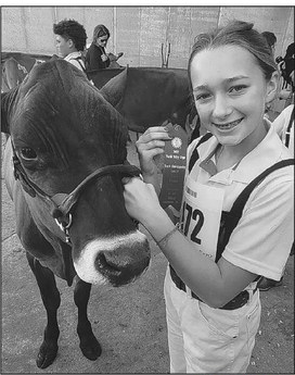 Loyal girl is second-best showman at recent World Dairy Expo