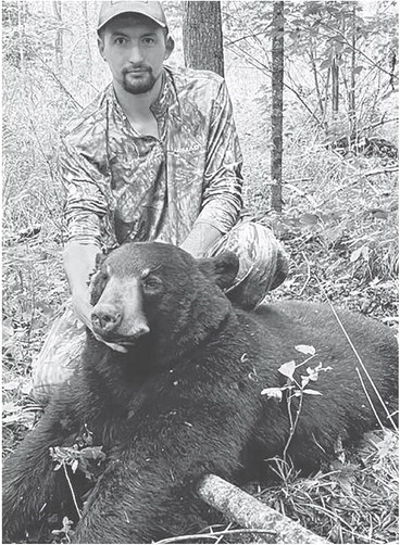 Weiland sticks with it, gets rewarded with his Marathon County bear
