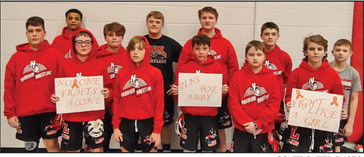 NGL wrestlers get ‘pins for Abby’