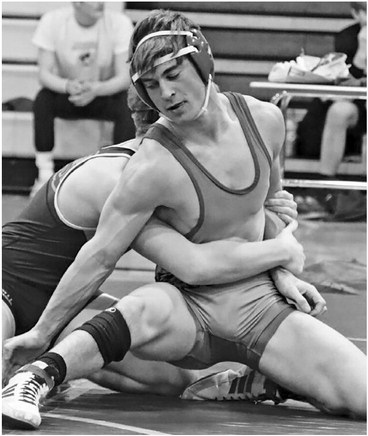 Duellman wins twice in home meet, team wins all matches with Luck