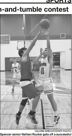Spencer narrowly defeats Greenwood in rough-and-tumble contest Spencer narrowly defeats Greenwood in rough-and-tumble contest