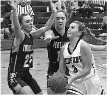 Hodags speed up game, pull away late; girls beat Hatchets