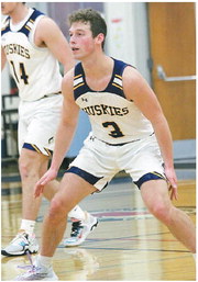 Locals successfully compete in men’s basketball, women’s swim Locals successfully compete in men’s basketball, women’s swim