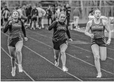 Hornet girls take first at home, boys fourth