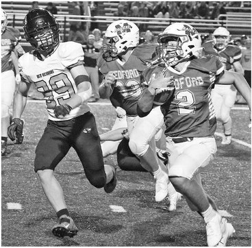 Tigers pounce on Raiders early, roll to 20-point win in opener Tigers pounce on Raiders early, roll to 20-point win in opener