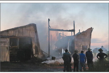 Fire claims barn in between Greenwood and Loyal