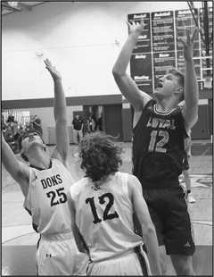 Loyal basketball boys fall to Columbus before holiday break Loyal basketball boys fall to Columbus before holiday break