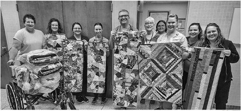 Creative Hideaway donates quilts to oncology patients