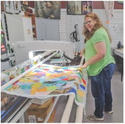 Creative Hideaway donates quilts to oncology patients