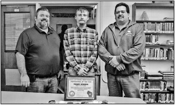 Athens custodian honored for commitment to his job