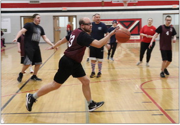 Special Olympians get back on the court in Spencer exhibition