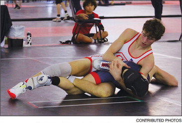 Local wrestlers compete, place  in Dells tournament