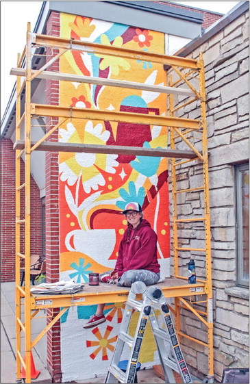 Marathon alum adds color downtown