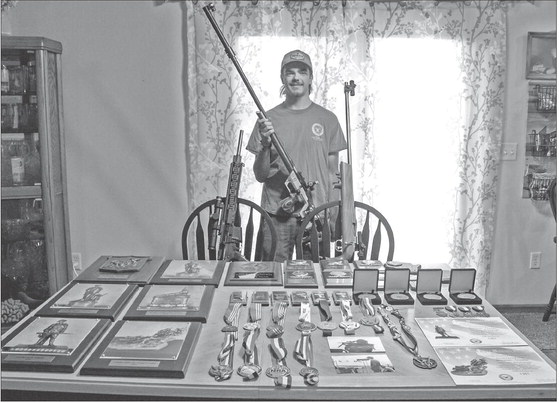 Marathon grad excels at marksmanship