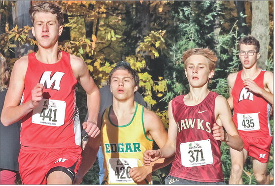 Runners battle for a conference title Runners battle for a conference title