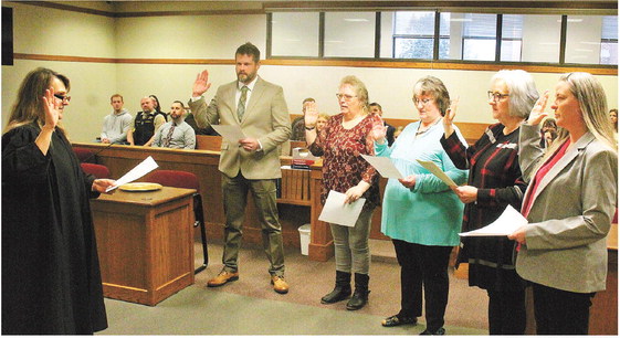 County OKs staffing increase over objections County OKs staffing increase over objections