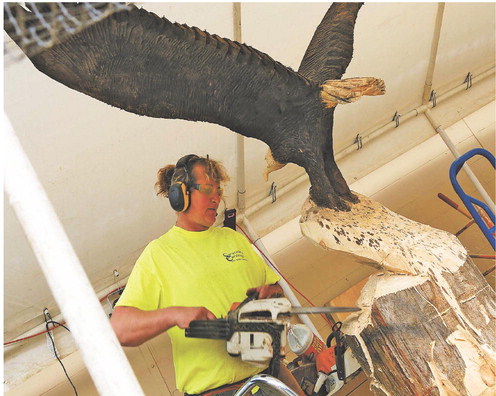 Gilman artist carves a niche with wooden statues