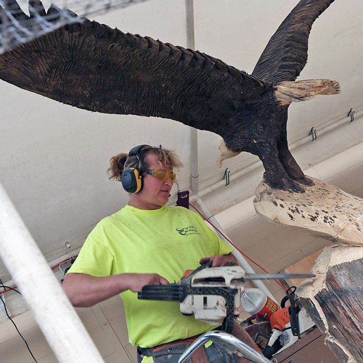 Gilman artist carves a niche with wooden statues