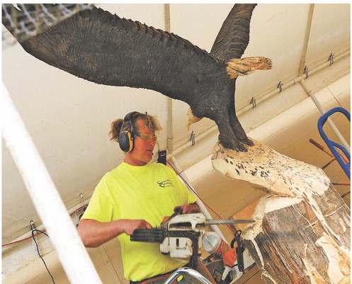 Gilman artist carves a niche with wooden statues Gilman artist carves a niche with wooden statues