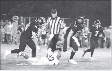 LG football solidly defeats Colby Hornets