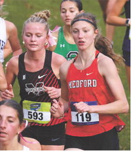 Kahn conquers state course this time, takes 12th