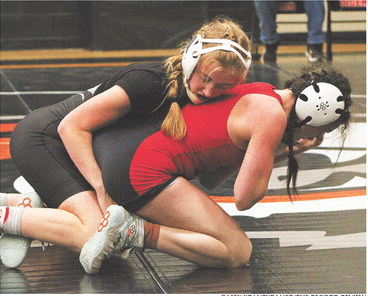 Two 2nds for the girls; boys 7th in dual tournament