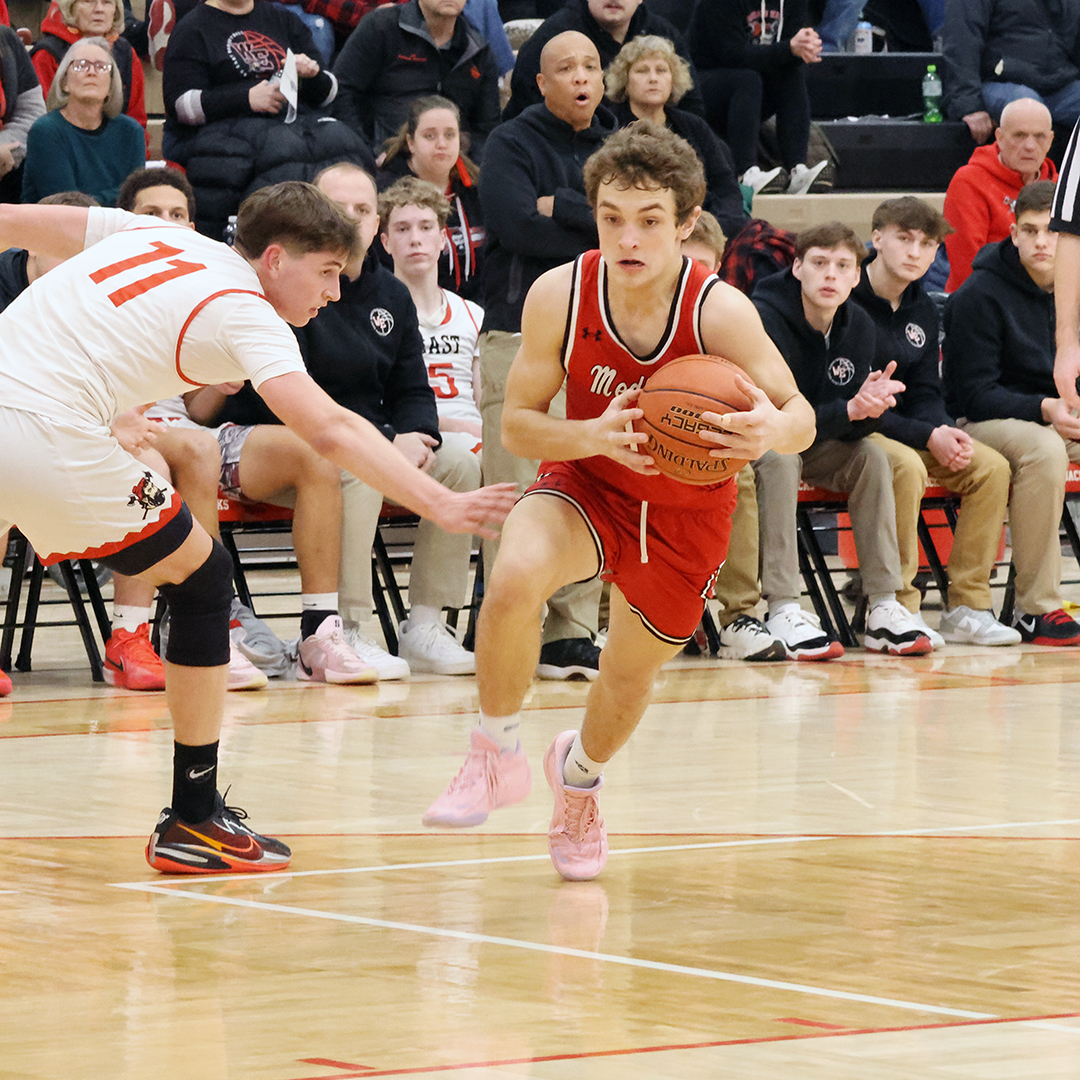 East wins the rebounding battle, wins the game by two