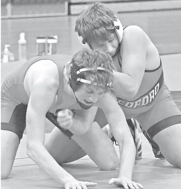 pinned Wisconsin Rapids freshman Morgan Bravener in 1 pinned Wisconsin Rapids freshman Morgan Bravener in 1