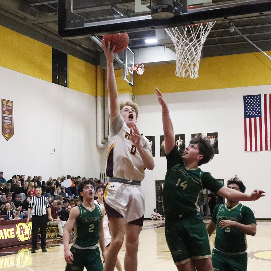 First win in new gym comes easily for Redmen First win in new gym comes easily for Redmen