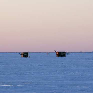 Get those ice shanties off before they fall in!