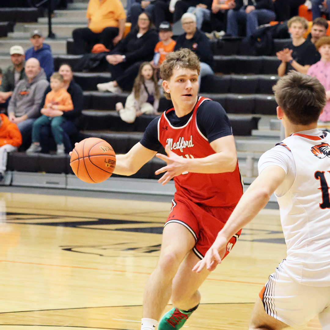 Medford sticks with Tigers until last five minutes in loss