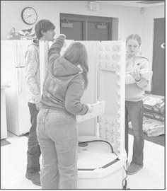 Ag students learn by doing through gardening, tree tapping, and more