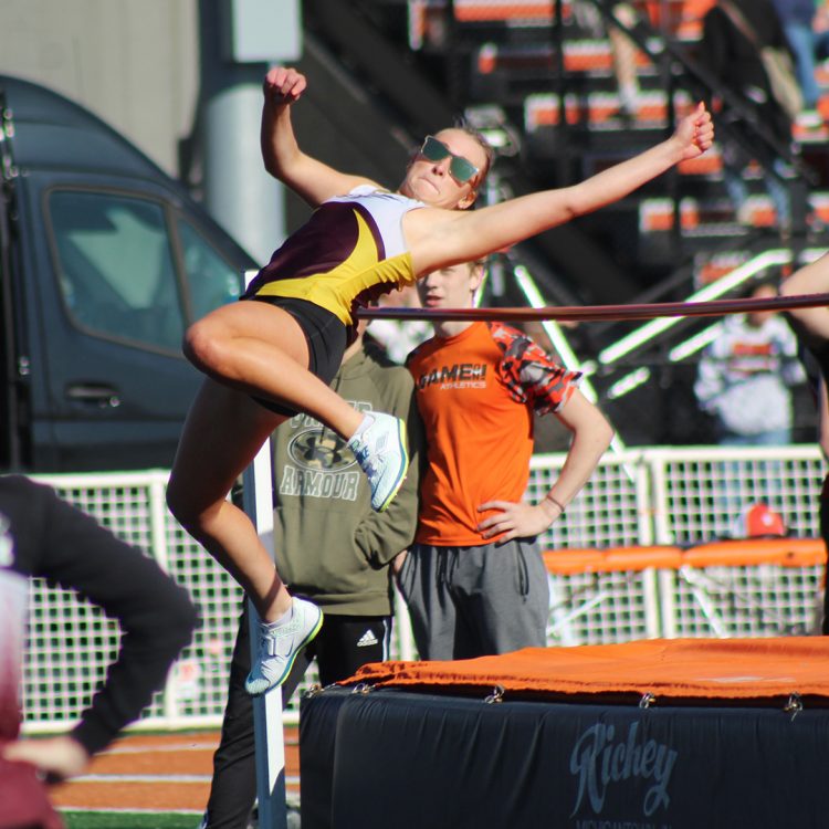 Rademacher reaches record height; Tlusty, Regier get wins at East